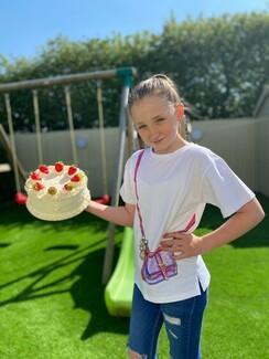 Olivia Herring with a cake 