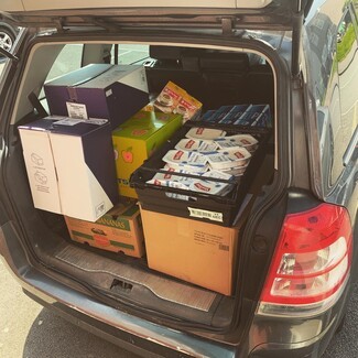 Food parcel in back of a car