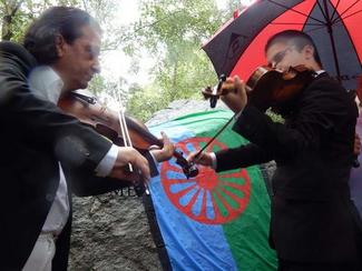 Romani musicians play at the Holocaust Memorial Gardens, Hyde Park, London, on August 2nd, 2016, for Roma Holocaust Remembrance Day © free please credit TT/Mike Doherty