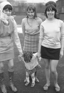Mother and daughter with teenager and young woman. 1971. Barnsley. South Yorkshire. © KIERON FARROW.
