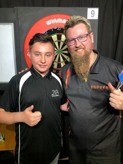 Buster Turner with mentor and professional darts player Simon Whitlock 