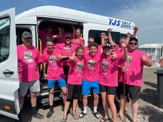 Levi-George and his fellow hikers bussed between the three highest mountains in England, Scotland and Wales to complete the Three Peaks Challenge