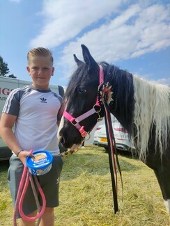 Johnny and Heartbreaker who won a Rising Star rosette