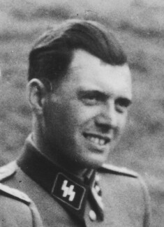 Josef Mengele at Auschwitz Photographer unknown, either Bernhard Walther or Ernst Hofmann or Karl-Friedrich Höcker, Public domain, via Wikimedia Commons