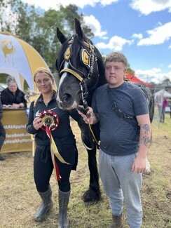 Best at Appleby winner Dan with handlers Toni and Brandon