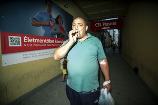 A Hungarian Roma man walks home after selling his plasma in northern Hungary - for some poverty-stricken Roma, this is the only way to survive (c) Béla Váradi