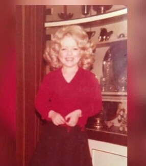 "We respected this golden-hearted woman" - The author, Dee Cooper, dressed as Dolly Parton for a school fancy dress. Photo courtesy of Dee Cooper