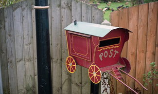 Traveller site post box. Still by Percy Dean from Turning Point video