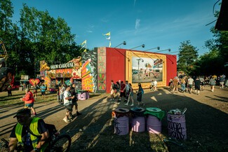 landscape of billboard and fairground wheel